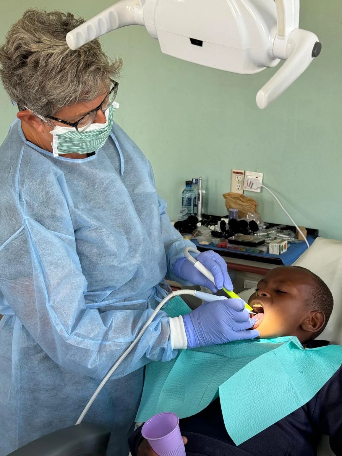 Volunteer providing dental care
